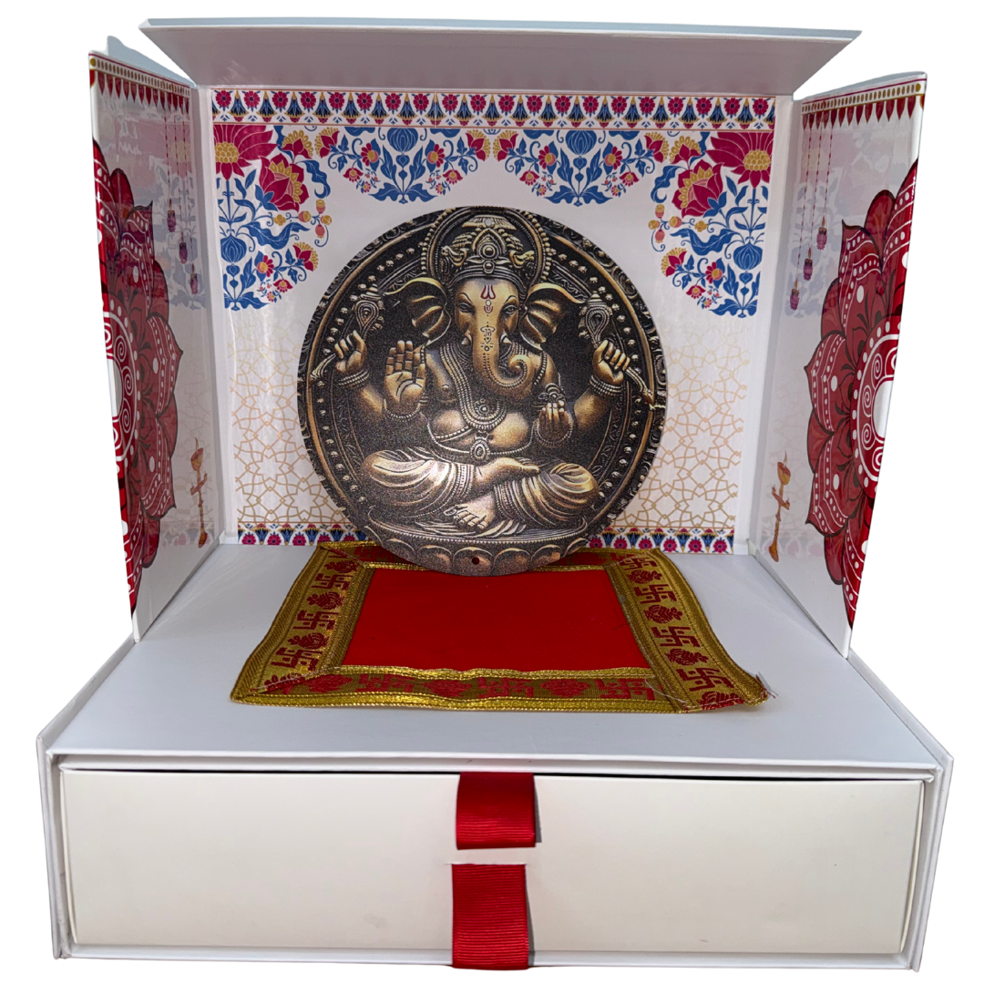 Divine Sansar-Mangal Bhawan : Personal Portable Temple-Decorative box with a metallic Ganesha figure on a red cloth against a colorful floral and geometric patterned background.
