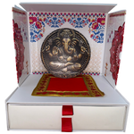 Divine Sansar-Mangal Bhawan : Personal Portable Temple-Decorative box with a metallic Ganesha figure on a red cloth against a colorful floral and geometric patterned background.