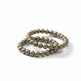 Divine Sansar-Two authentic raw pyrite bead bracelets for wealth manifestation  on a white background