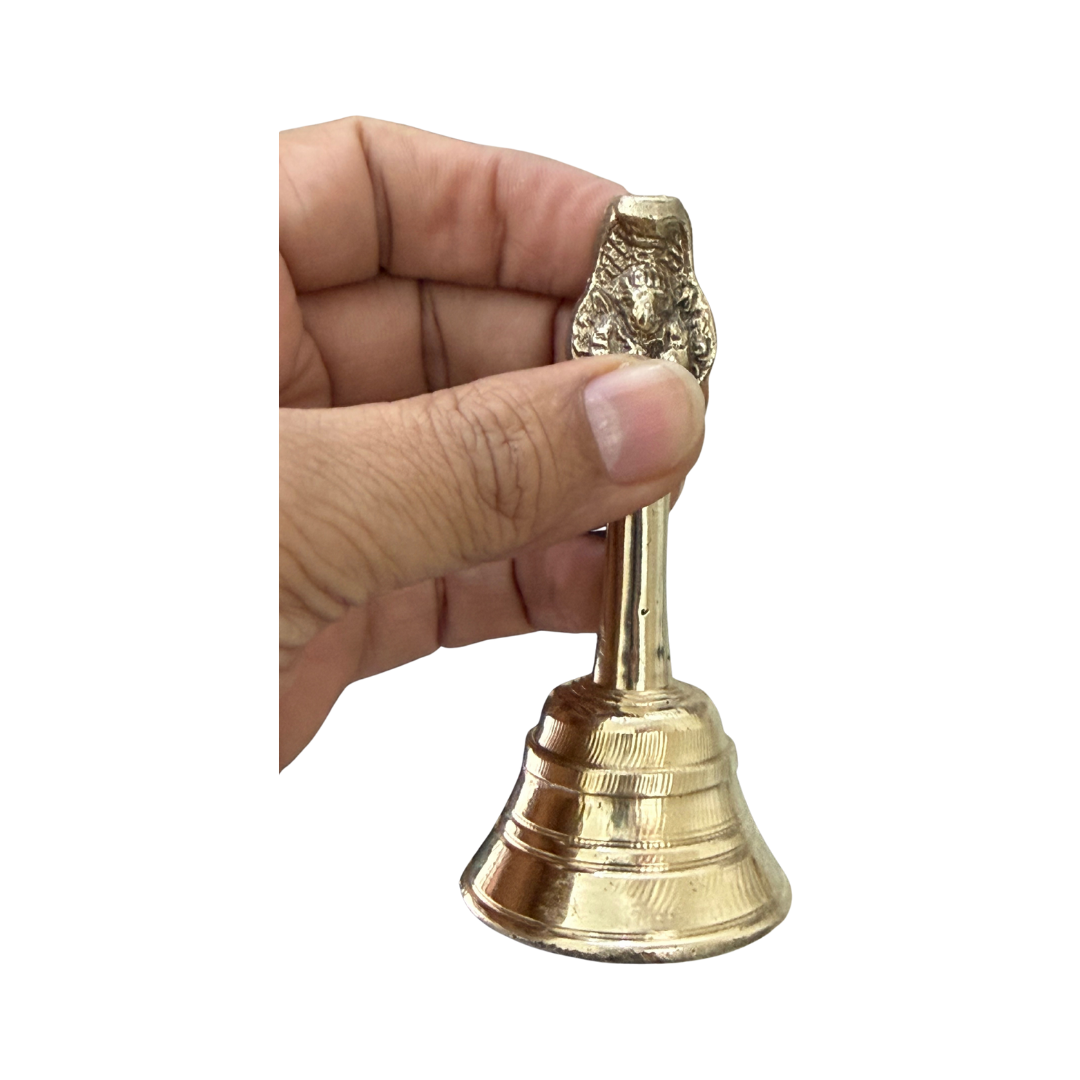 Divine Sansar-Pooja Ghanti-A hand holding Brass puja Bell 