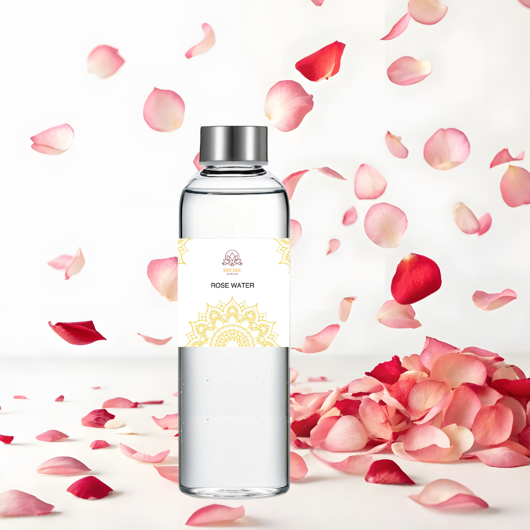 Divine Sansar-ROSEWATER-Bottle of rose water with rose petals on a light background