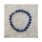 Divine Sansar-WisdomBracelet-LapisLazuli bracelet on a textured white background