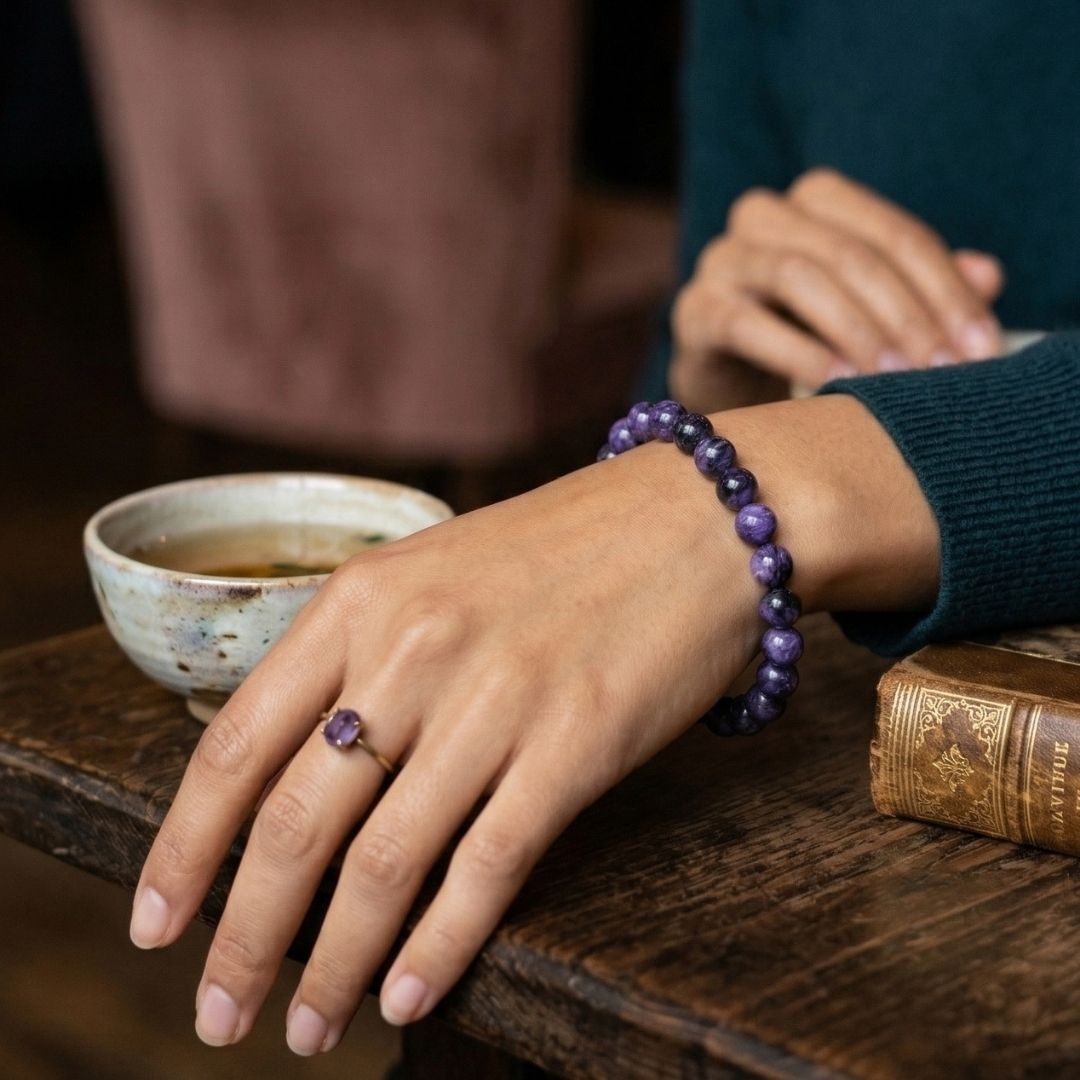 Divine Sansar-Wisdom Bracelet- Lapis Lazuli 6-Hand with purple beaded bracelet and ring on wooden surface 