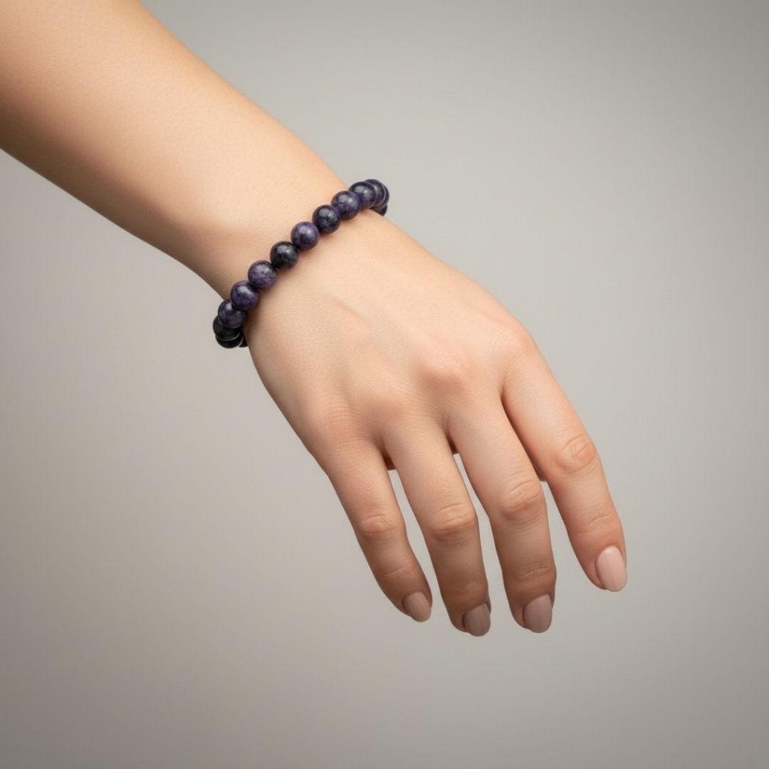 Divine Sansar-Wisdom Bracelet- Lapis Lazuli 7-an woman hand weaing a purple coloured wisdom bracelet lapis lazuli