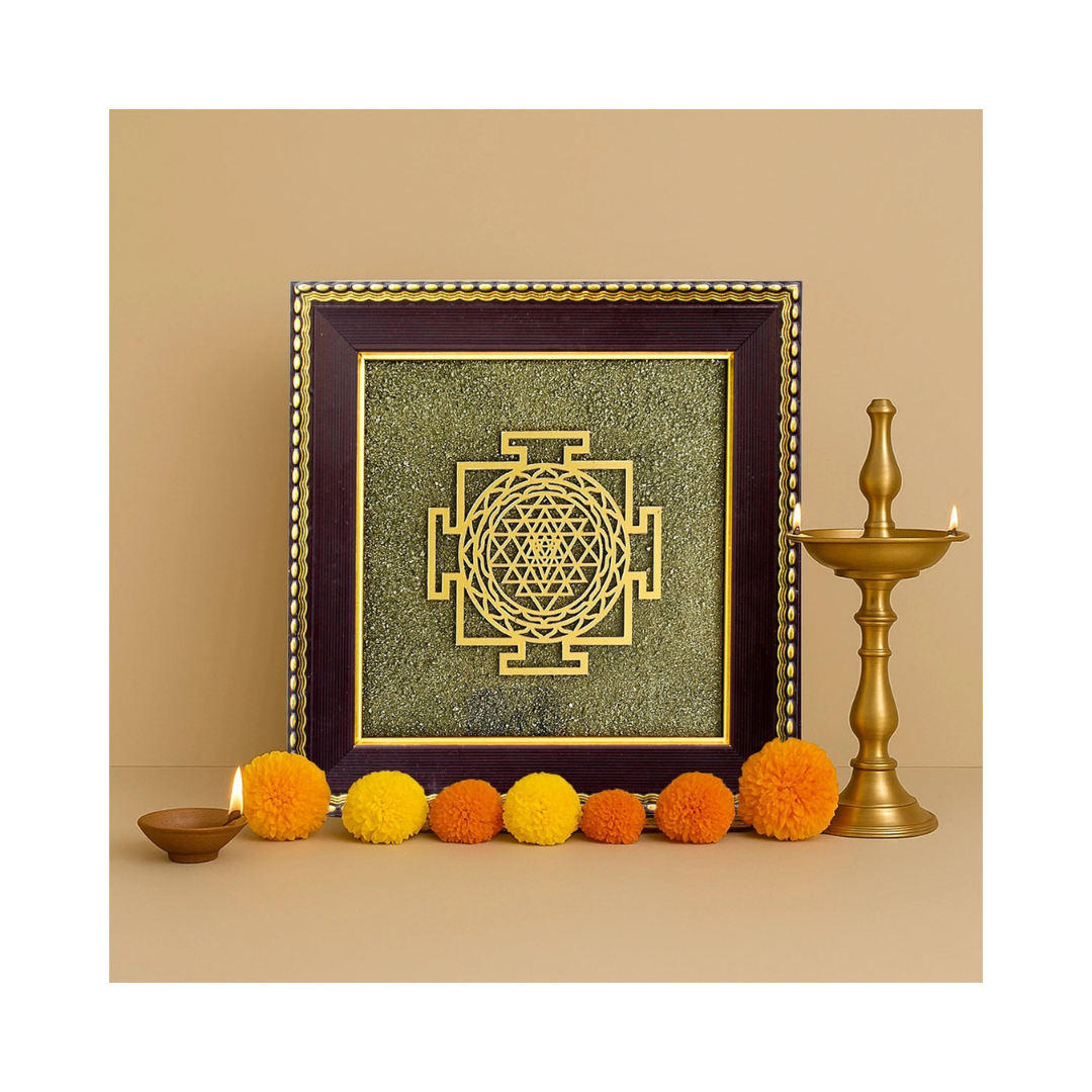Pyrite Frame Shree Yantra lifestyle with diyas and flowers - Divine Sansar