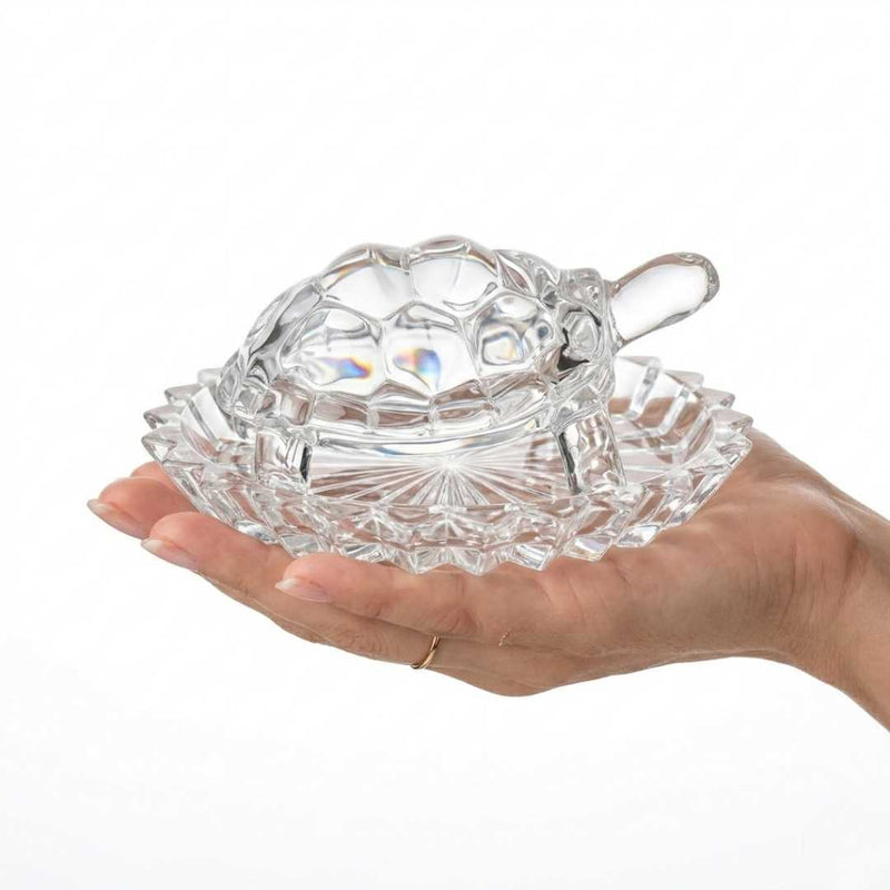 Divine Sansar Wish Fulfilling Crystal Turtle- held in a hand against a white background