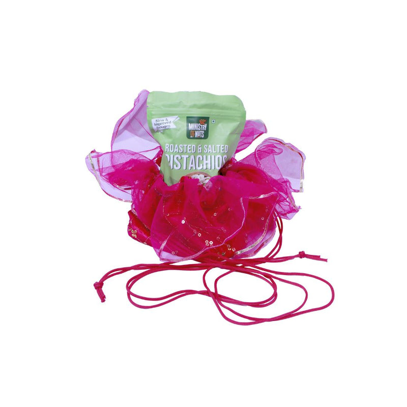 Divine Sansar Elegant Traditional Shagun Potli Pink, containing a pistachios packet in it, on a white background