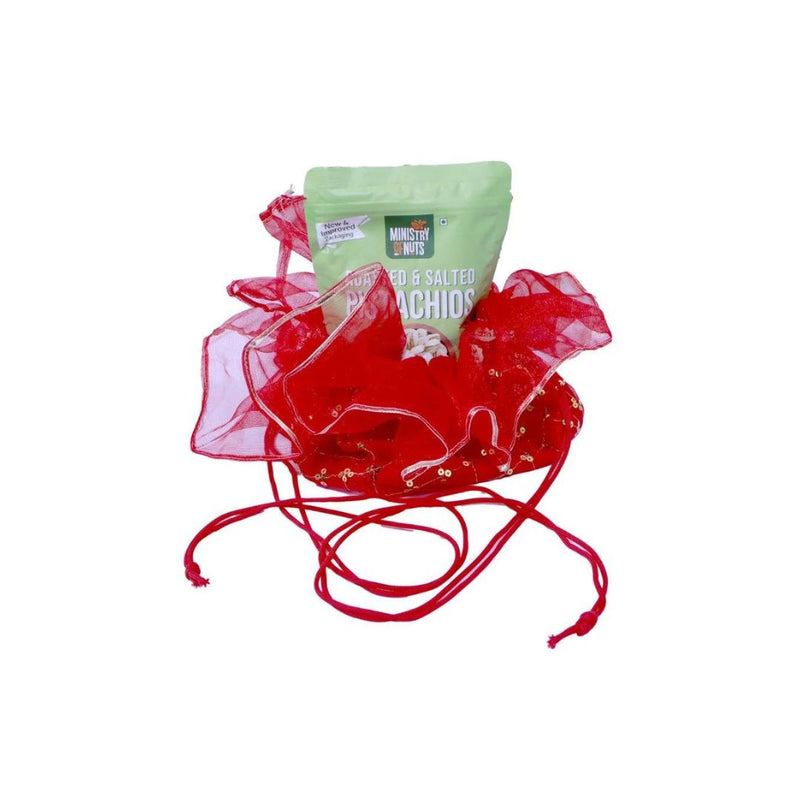 Divine Sansar Elegant Traditional Shagun Potli Red, containing a Pistachios packet in it, on a white background