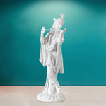 Divine Sansar Elegant White Krishna Statue Playing Flute against a sky background