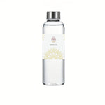 Divine Sansar Gangajal 1 litre glass bottle with a silver cap on a white background