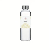 Divine Sansar Gangajal 1 litre glass bottle with a silver cap on a white background