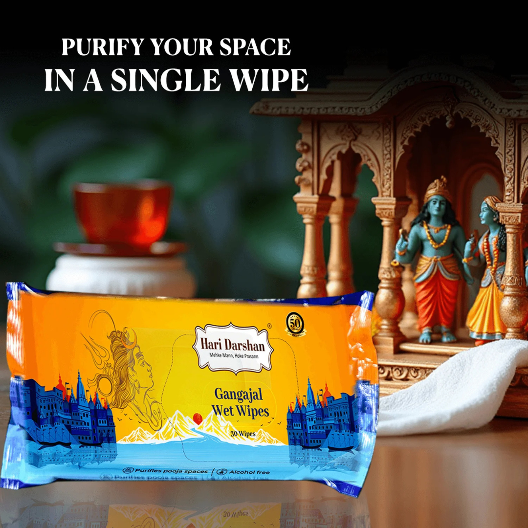 Pack of Divine Sansar Gangajal Wet Wipes with a traditional setting in the background
