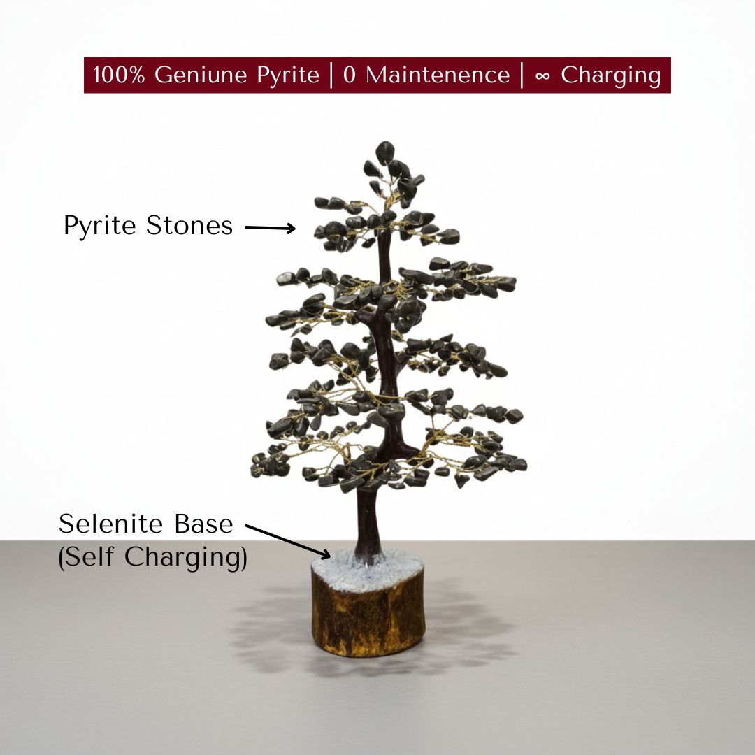 Decorative tree made of pyrite stones with a selenite base on a white background