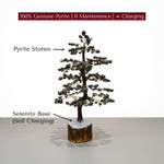 Decorative tree made of pyrite stones with a selenite base on a white background