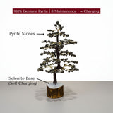 Decorative tree made of pyrite stones with a selenite base on a white background