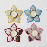 Divine Sansar Glass Work Lotus Tealight Holder Set (4 pcs):Red, Yellow, Blue & Pink on a white background
