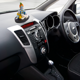 Divine Sansar-Hand-Painted Baby Krishna with Calf Idol-Car dashboard with a Krishna with calf statue on the dashboard