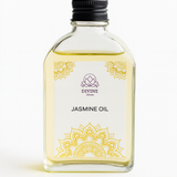Divine Sansar Bottle of Jasmine oil with a decorative label on a white background
