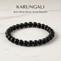 Karungali bracelet 27 black ebony 8mm beads on elastic, lab tested - Divine Sansar