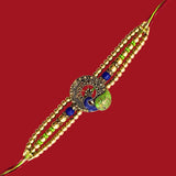 Divine Sansar Meenakari Peacock Rakhi Design 1, made with gold beads and colorful stone on a red background