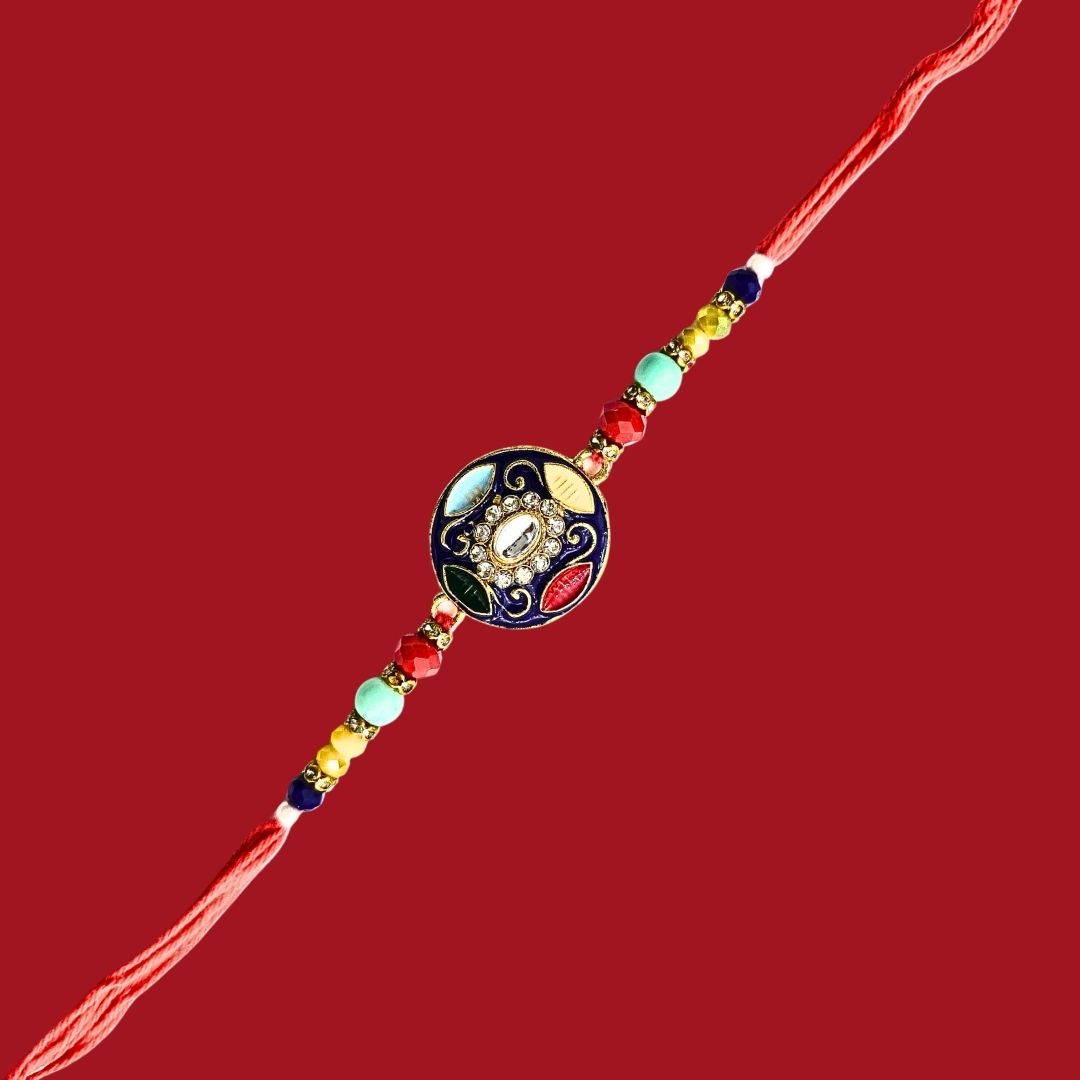 Divine Sansar Meenakari Stone Rakhi Design 1 on a red background