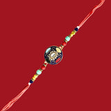 Divine Sansar Meenakari Stone Rakhi Design 1 on a red background