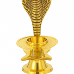 Divine Sansar-A golden brass Narmadeshwar Shivling stand featuring a multi-layered base and an upright, engraved hooded cobra (Sheshnag) backdrop.