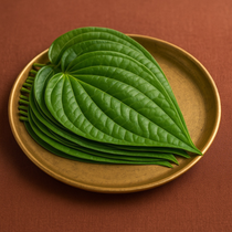 Divine Sansar Paan ka Patta-Green betel leaves on a brass plate against a brown background