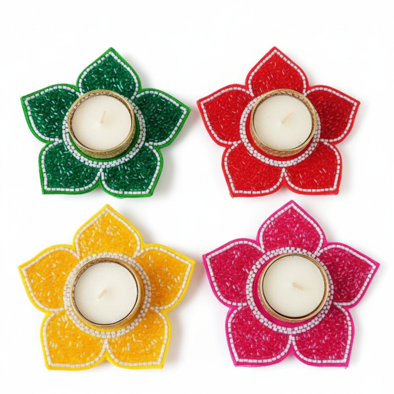 Divine Sansar Glass Work Lotus Tealight Holder Set with candles inside on a white background.