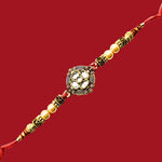 Divine Sansar Premium Designer Rakhi on a red background