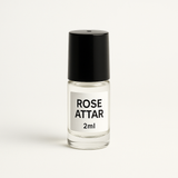 Divine Sansar-Rose Attar 2ml bottle with a black cap on a white background