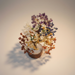 Seven Chakra Crystal Tree of Life self-charging on a neutral background