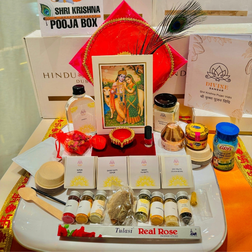 Divine Sansar-Shri Krishna Pooja Box including a photo frame, incense sticks, and various religious articles on a white tray.