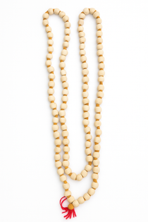 Divine Sansar-Tulsi Beads Mala with a red tassel on a white background