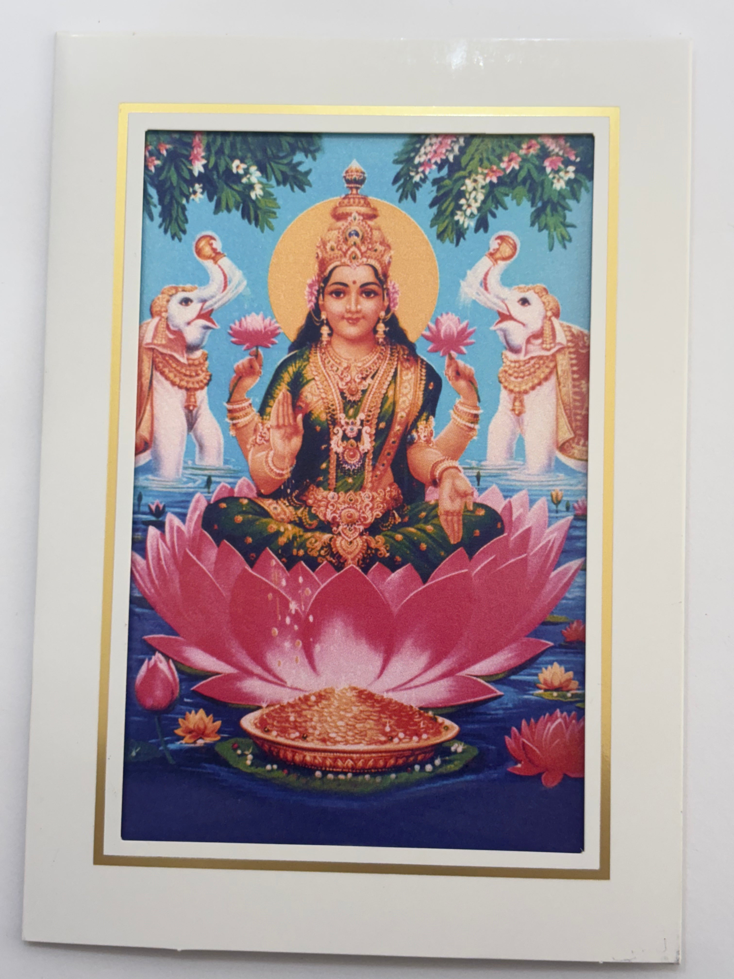 Divine Sansar Vaibhav Laxmi Photo Frame on a pink lotus with two elephants and flowers in the background.