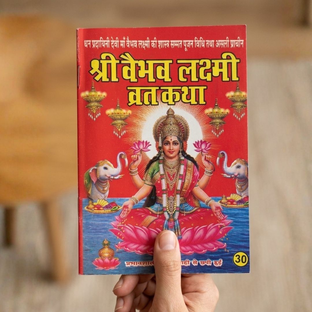 Vaibhav Laxmi Vrat Katha pocket book held in hand for scale - Divine Sansar