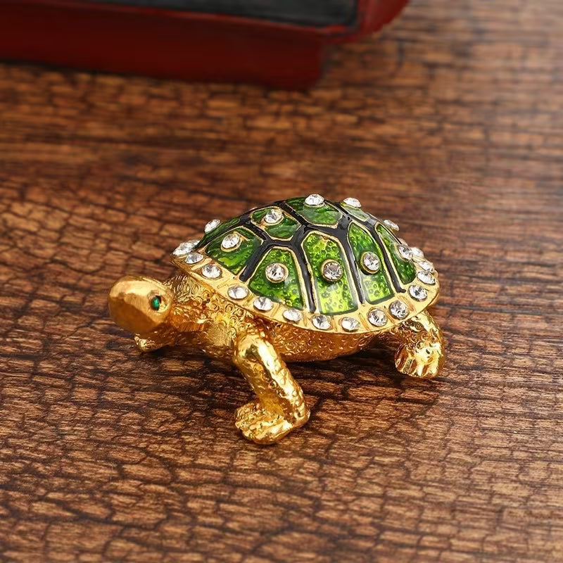 Divine Sansar-Wish Fulfilment Turtle with Hidden Chamber-green-Decorative turtle figurine with green and gold colors on a wooden surface