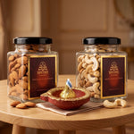 Almond and cashew gift jars with red and gold clay diya for Diwali return gifts - Divine Sansar