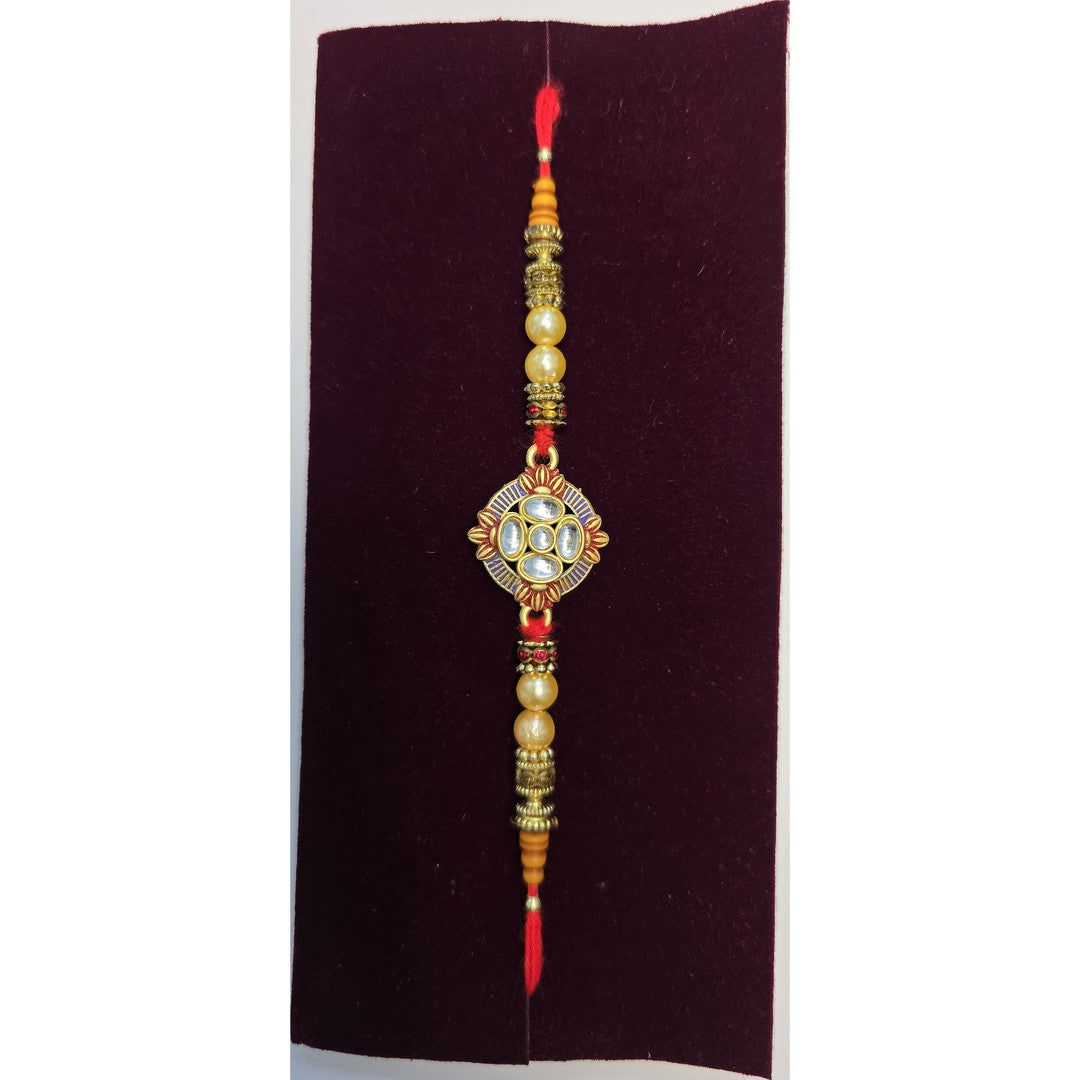 Amber diamond kundan rakhi close up Divine Sansar
