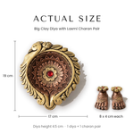 Actual size of the big clay diya 19 x 17 x 4.5 cm and Laxmi Charan 8 x 4 cm each - Divine Sansar