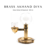 Brass akhand diya with 200ml glass globe reservoir and side wick cup - Divine Sansar