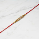 Chandan Sri Sandalwood Beads Rakhi on marble - Divine Sansar