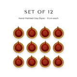 Set of 12 hand-painted 6cm clay diyas for Diwali in UAE - Divine Sansar