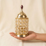 Crystal Diya brass oil lamp held in hand for scale - Divine Sansar