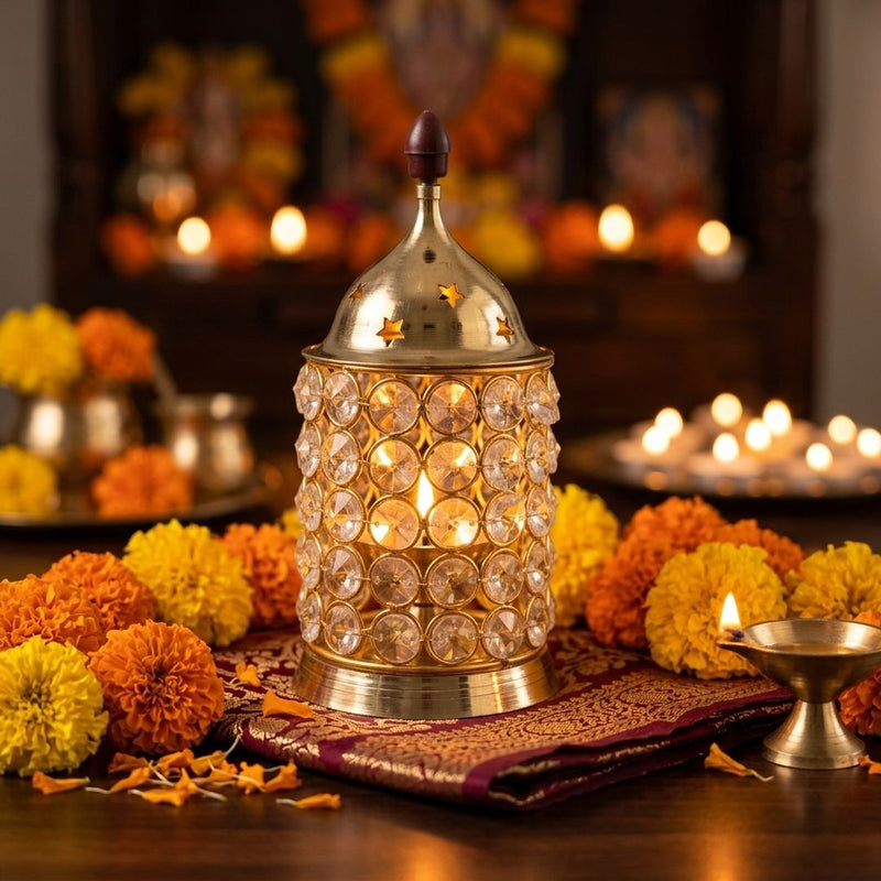 Lit Crystal Diya oil lamp with marigold decor - Divine Sansar