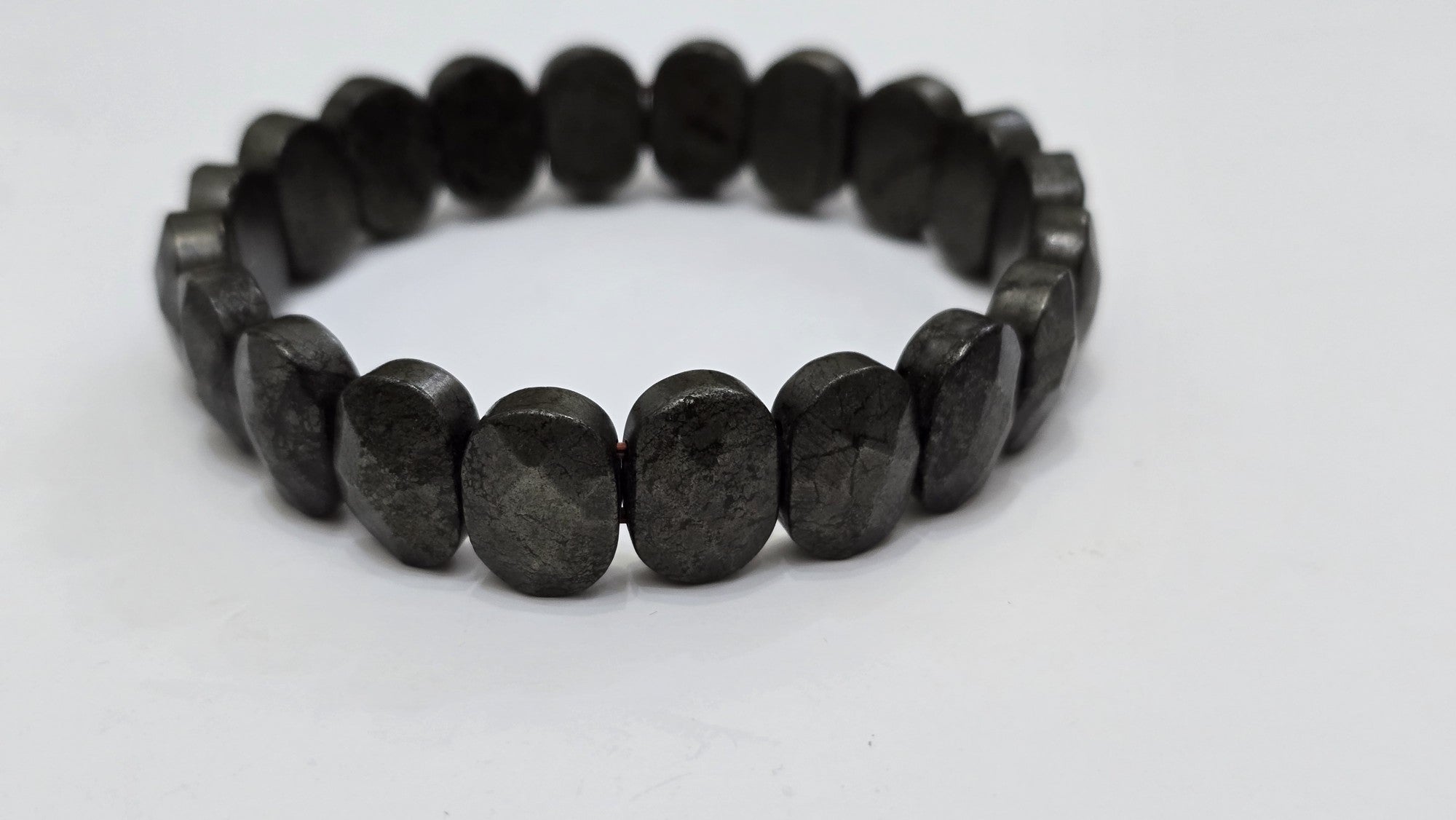 Real unedited photo of natural flat pyrite bead bracelet - Divine Sansar