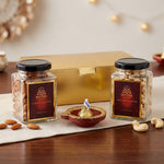 Diwali dry fruit return gift box with almond and cashew jars, clay diya and gold gift box - Divine Sansar UAE