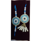 Turquoise beaded evil eye rakhi and lumba set close up Divine Sansar