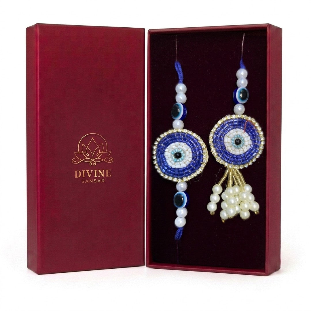 Drishti Jodi Neelam sapphire evil eye bhaiya bhabhi rakhi set in Divine Sansar gift box