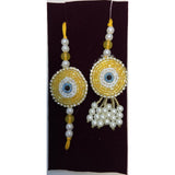 Golden beaded evil eye rakhi and lumba set close up Divine Sansar